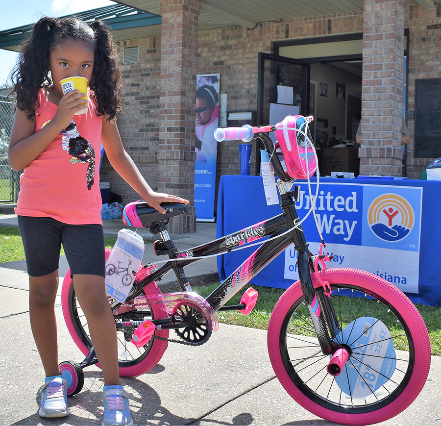 girl with ice cream and bicycle