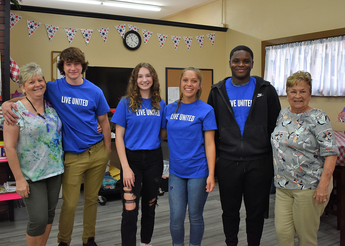 summer of service youth volunteers with seniors